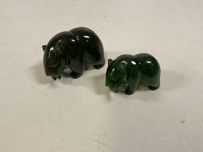 Lot 13 - Two nephrite jade ornaments of brown bears...