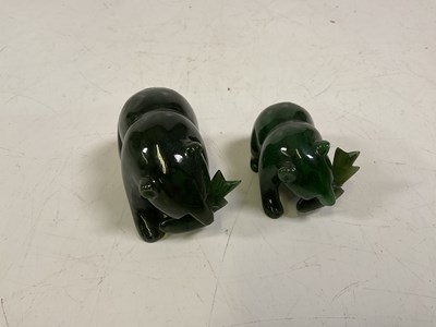 Lot 13 - Two nephrite jade ornaments of brown bears...