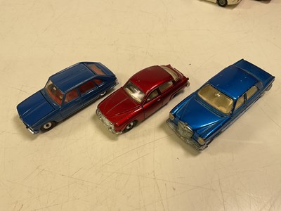 Lot 63 - DINKY; three toy cars including a Renault R16,...