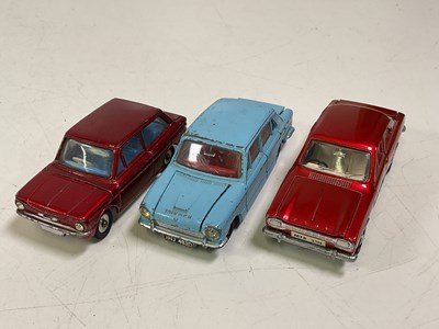 Lot 65 - DINKY; three toy cars including a Ford Escort,...
