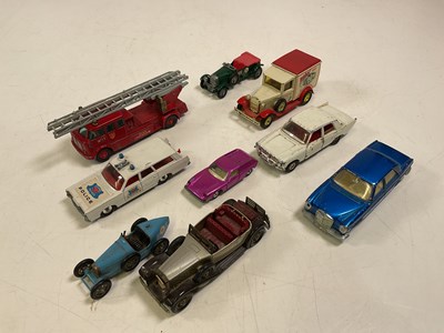 Lot 66 - A collection of mixed toy cars including...