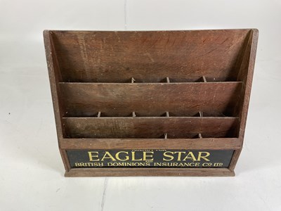 Lot 14 - A wooden document holder for Eagle Star and...