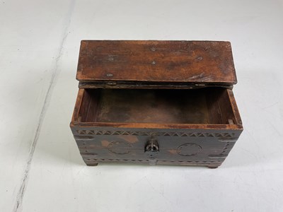 Lot 15 - A carved oak wooden safe box with metal hinges,...