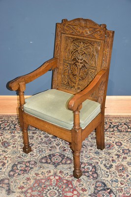 Lot 71 - A carved oak Wainscot type chair on block feet.