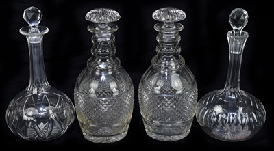 Lot 517 - A pair of cut glass decanters with faceted...