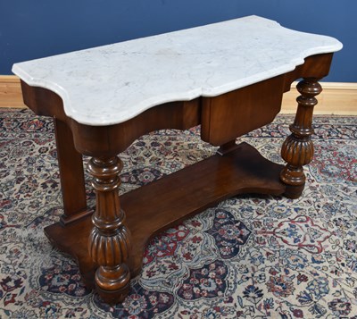 Lot 66 - A 19th century walnut duchess stand with...