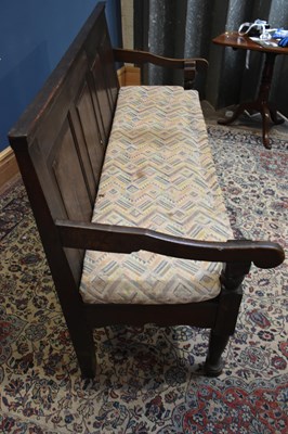 Lot 8 - An 18th century oak settle with four panel...