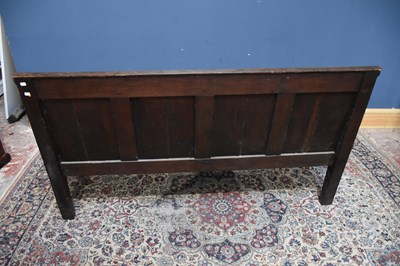 Lot 8 - An 18th century oak settle with four panel...