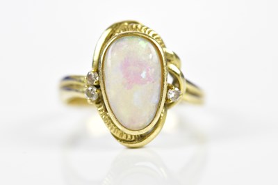 Lot 179 - A 14ct yellow gold opal and diamond ring, size...