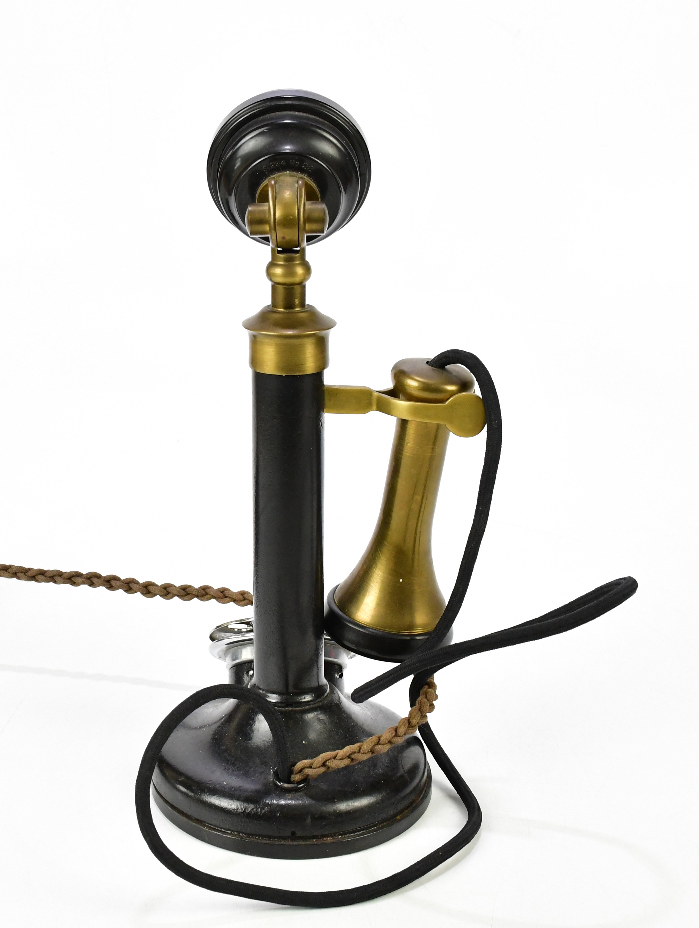 Lot 294 A vintage candlestick telephone, height 32cm.