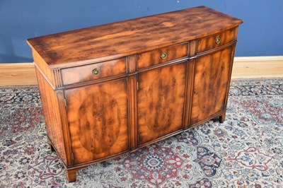 Lot 105 - RACKSTRAW; a reproduction yew wood bowfront...