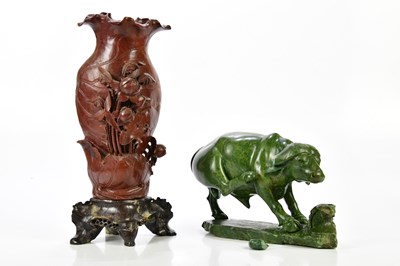 Lot 1271 - A Chinese carved soapstone vase on stand,...