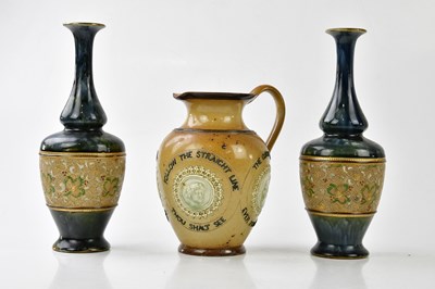 Lot 1300 - ROYAL DOULTON; a pair of Art Ware vases with...