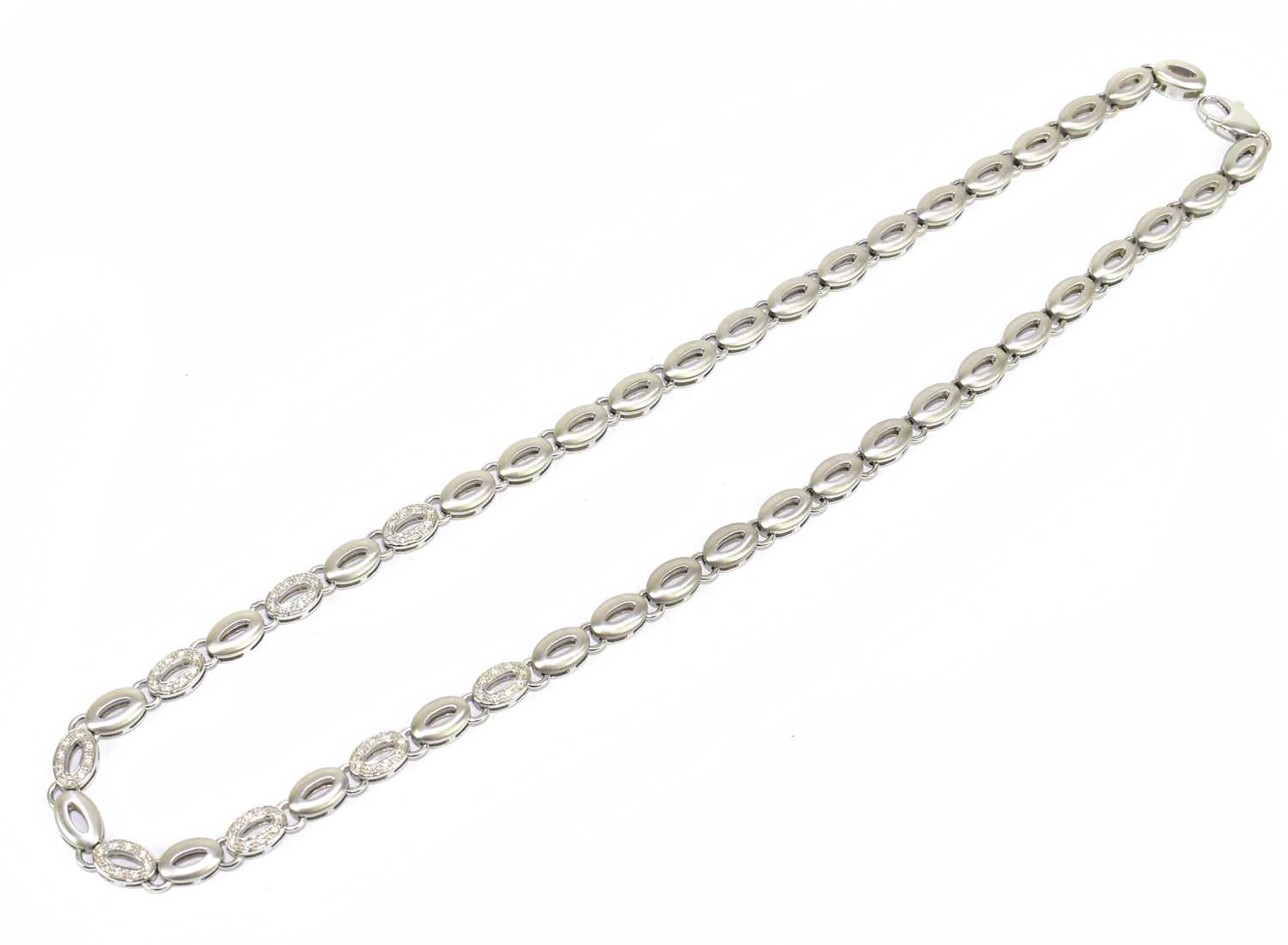 Lot 1298 - An 18ct white gold satin finish necklace set...