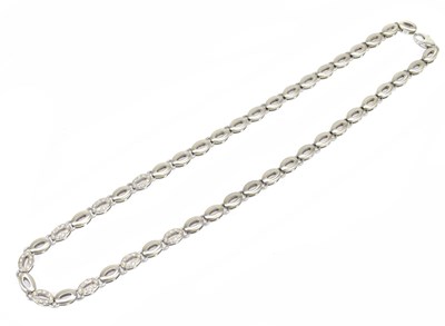 Lot 1298 - An 18ct white gold satin finish necklace set...