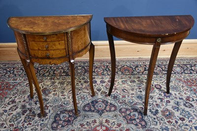 Lot 204 - A reproduction walnut three drawer side table,...