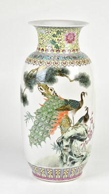 Lot 1255 - A modern Chinese vase decorated with peacocks,...