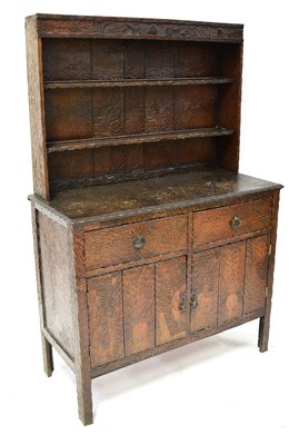 Lot 1 - An unusual early 20th century oak dresser with...
