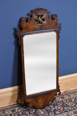 Lot 259 - A George III mahogany fret frame wall mirror,...