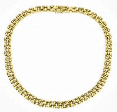 Lot 1301 - A yellow metal brick link necklace, stamped...