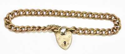 Lot 1258 - A 9ct rose gold curb link bracelet with...