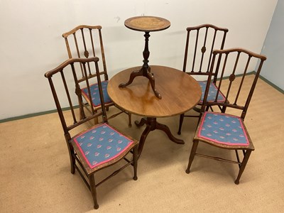 Lot 538 - A set of four chairs and two tables, largest...