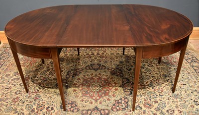 Lot 55 - A Georgian mahogany extending D-end table with...