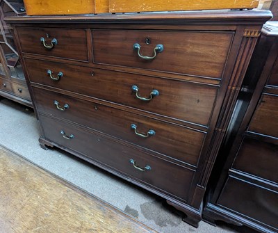 Lot 111 - A 19th century mahogany chest of two short...