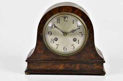 Lot 2143 - A 1930s walnut mantel clock with silvered dial...