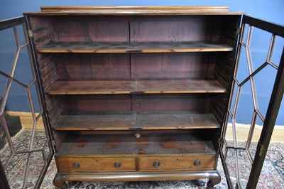 Lot 73 - A late 19th century mahogany bookcase with a...