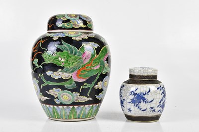 Lot 1200 - A Chinese Famille Noire ginger jar and cover,...