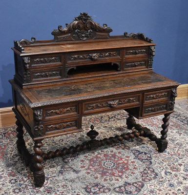Lot 24 - A 19th century Flemish style carved oak desk...