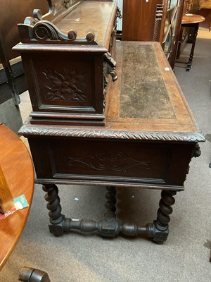 Lot 24 - A 19th century Flemish style carved oak desk...