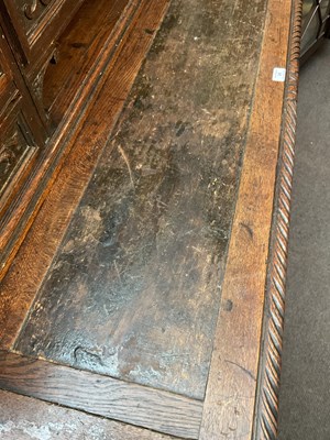 Lot 24 - A 19th century Flemish style carved oak desk...