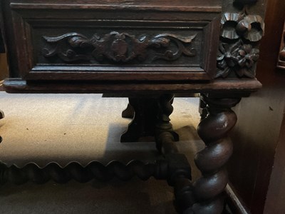 Lot 24 - A 19th century Flemish style carved oak desk...