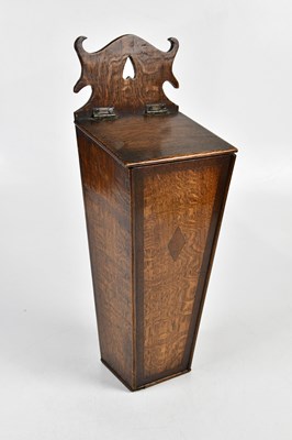 Lot 1089 - A 19th century oak candle box, height 47cm.