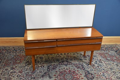 Lot 149 - AVALON; a mid century teak mirror back...