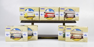 Lot 1169 - CORGI; a group of nine boxed trams to include,...