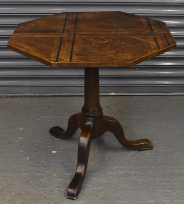 Lot 23 - A 19th century oak octagonal tripod table with...