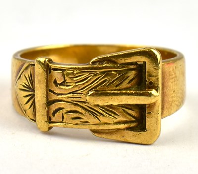 Lot 778 - A 9ct gold buckle ring, size U, approx 7.2g.