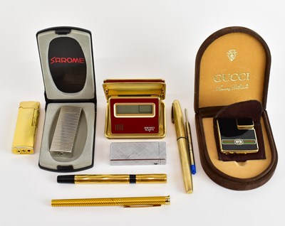 Lot 340 - GUCCI; a cased Accessory Collection cigarette...