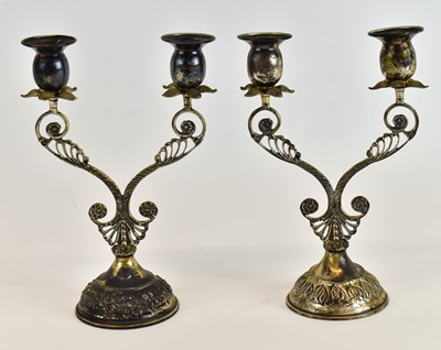 Lot 735 - A pair of 900 grade two branch candlesticks,...