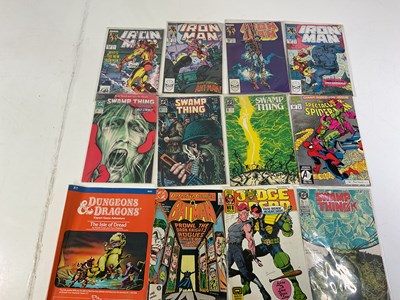 Lot 184 - A mixed collection of books and comics...