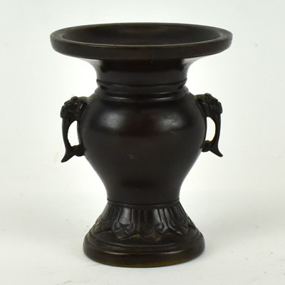 Lot 665 - A small 19th century Chinese bronze vase with...