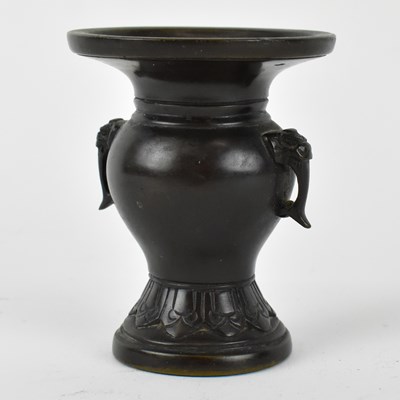 Lot 665 - A small 19th century Chinese bronze vase with...