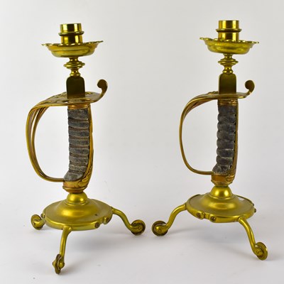 Lot 125 - A pair of early 20th century brass...