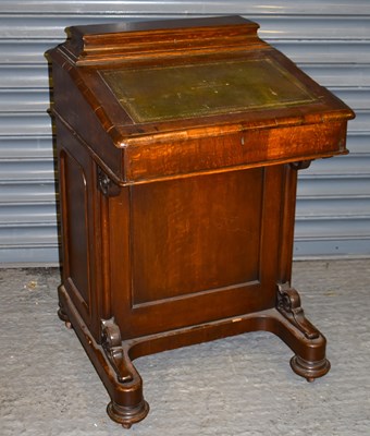 Lot 28 - A 19th century oak Davenport desk, with hinged...