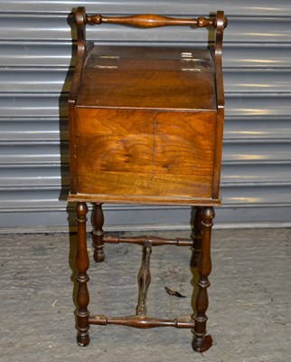 Lot 37 - A reproduction mahogany sewing table, with...