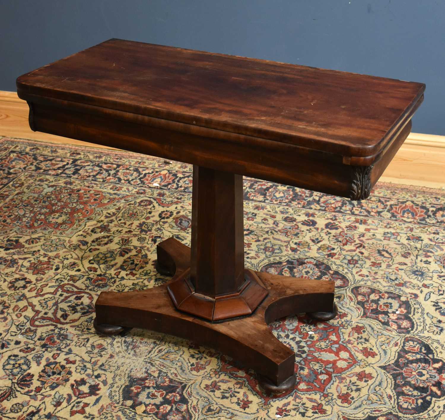 Lot 48 - A 19th century mahogany fold-over swivel top...