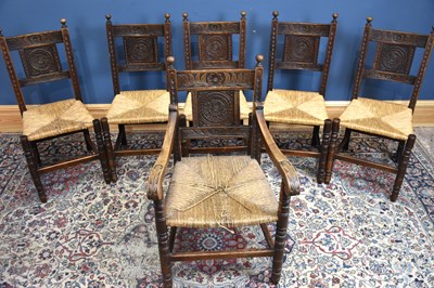 Lot 61 - Six 19th century rush seated dining chairs (5+1).